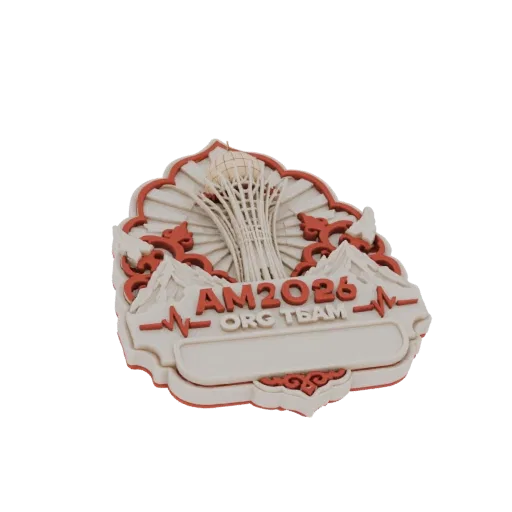 3D model of the AM2026 Org Team emblem, featuring a stylized tower, mountains, and a heartbeat line with text.