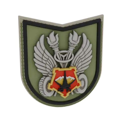 3D model of a military emblem with silver wings, flaming torches, and a red and yellow shield featuring a mountain landscape.