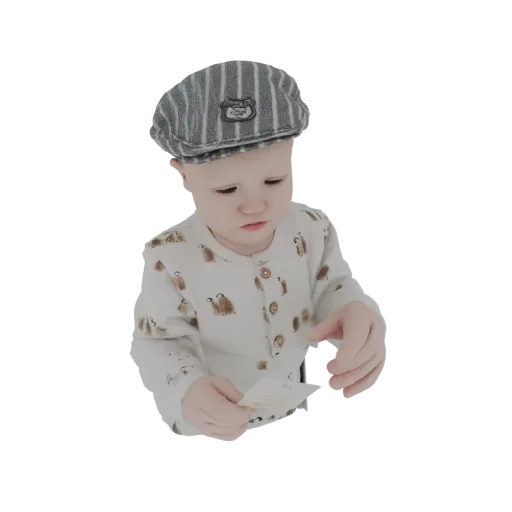 Modèle 3D d'un bébé portant une casquette rayée et un pyjama pingouin, tenant une petite carte.