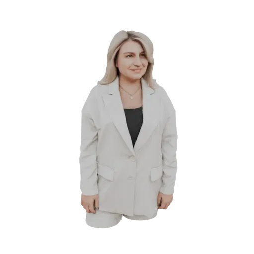 3D model of a woman wearing a white blazer and shorts, standing and looking to the side.