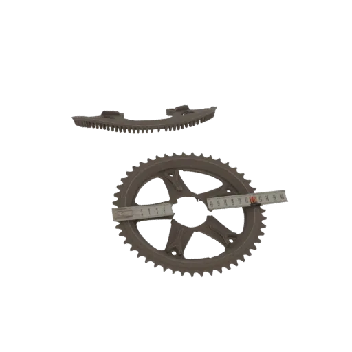 3D model of a bicycle chainring and a separate crankset, with measuring tapes on the chainring.
