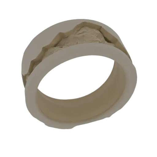 3D model of a ring with a detailed, textured mountain range encircling the band, presented on a white background.