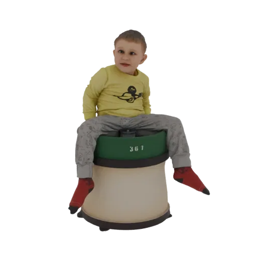 3D model of a young child sitting on a green and beige drum-shaped stool with the number 361 on the green band.