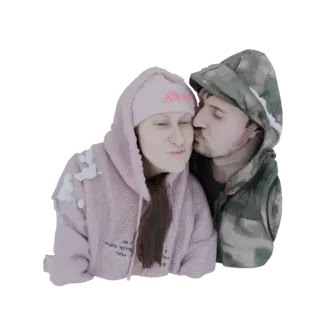 3D-Modell eines sich küssenden Paares, beide mit Wintermützen und Jacken, mit Schneidetails.