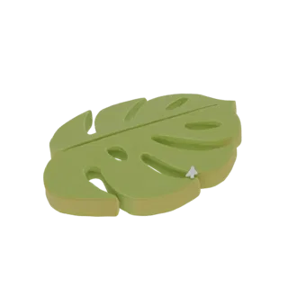 3D-Render eines grünen Monstera-Blatt-Untersetzers mit einem kleinen weißen Baum auf der Oberfläche, vor schwarzem Hintergrun