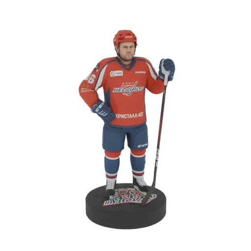3D model of an ice hockey player in a red and blue uniform, holding a hockey stick, standing on a puck-shaped base.
