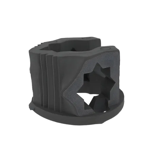 3D-Modell eines dunkelgrauen Industriekörpers mit einer markanten sternförmigen Öffnung und texturierter Außenseite.