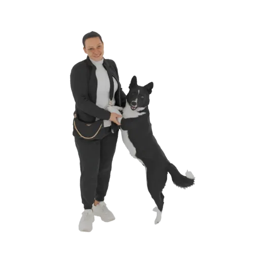 3D model of a smiling woman in black athletic wear holding a black and white dog that is jumping.