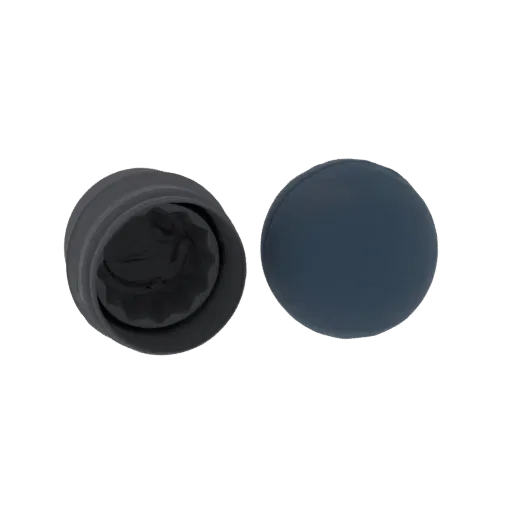 3D render of a dark grey textured cup with an intricate interior pattern, next to a smooth, dark blue spherical lid, on a bla