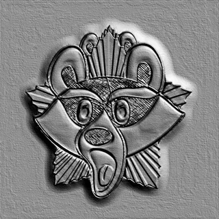 Modelo 3D del bajorrelieve "Medalla de Diógenes" estilo Art Decó, representando una cabeza de animal estilizada con ojos expr