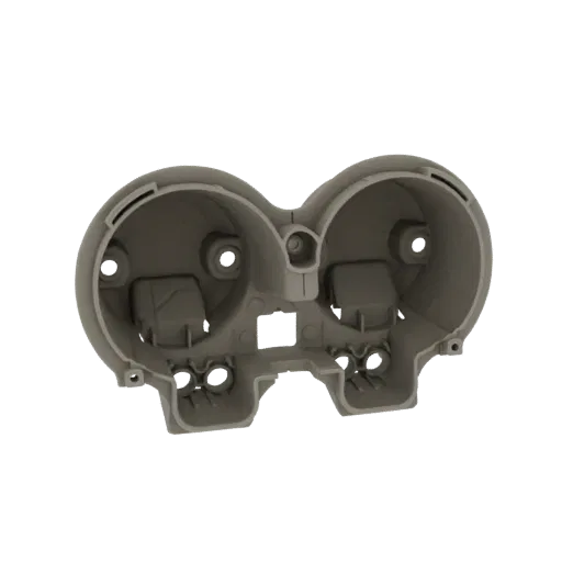 Modello 3D di un alloggiamento doppio per indicatori in plastica grigia con due grandi aperture circolari e punti di montaggi