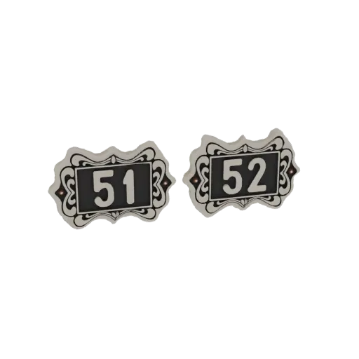 3D model of two ornate house number plaques, one showing '51' and the other '52', with decorative borders.