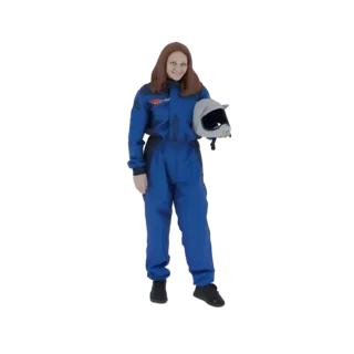 3D model of a female astronaut in a blue jumpsuit, smiling and holding her helmet.