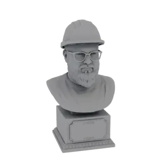 Renderização de modelo 3D de um busto cinza de um homem barbudo com capacete e óculos, em pé sobre uma base decorativa.