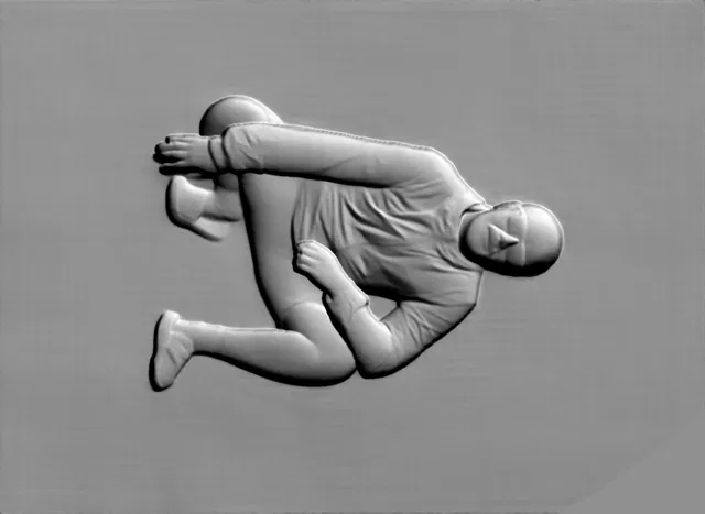 3D model of a speed skater bas-relief, frozen in a dynamic turn on the ice.