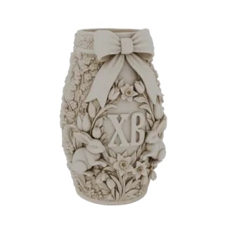 3D model of a decorative vase with Easter bunnies, tulips, daffodils, and the XB monogram, topped with a ribbon bow.