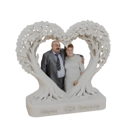 3D model of a white marble-like sculpture of a couple embracing within a heart-shaped tree, with engraved names on the base.