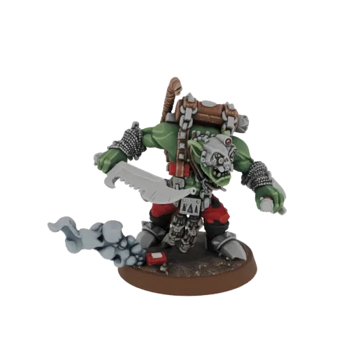 3D model of a green-skinned Orc Warrior in a charging pose, wielding a large serrated sword and leaving a smoke trail.