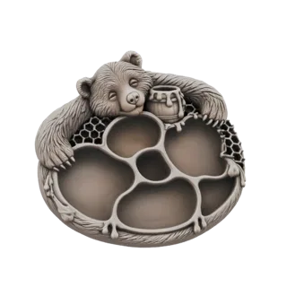 Modèle 3D d'un ours endormi avec un pot de miel et un design en nid d'abeille, doté d'un plateau à plusieurs compartiments.