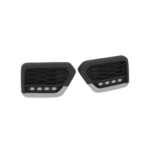 3D model of two car front bumper grilles, one left and one right, with black hexagonal mesh and silver trim featuring LED lights.