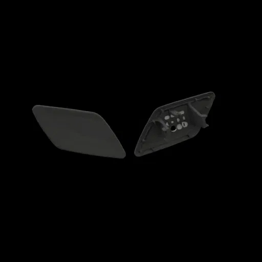 A 3D model of two dark gray car headlight washer covers, one smooth and one with internal mounting details, against a black b
