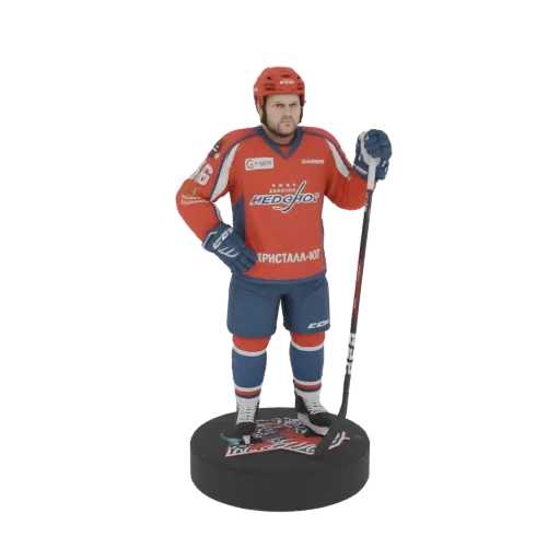 3D model of an ice hockey player in a red and blue uniform, holding a hockey stick, standing on a puck base.
