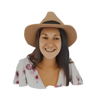 3D model render of a smiling woman wearing a straw hat and a white dress with a floral pattern, against a white background.