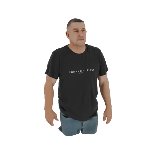 3D model of a man wearing a black Tommy Hilfiger t-shirt and blue jeans, standing with a neutral expression.