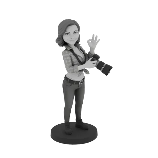 Modèle 3D de photographe femme stylisée tenant un appareil photo et faisant un signe OK, debout sur une base circulaire.