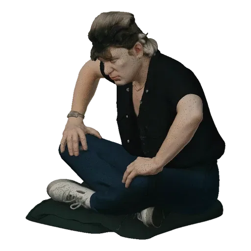 3D model of a man with brown hair, wearing a black short-sleeved shirt and blue pants, sitting cross-legged on a dark cushion