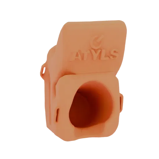 3D model of the ATYLS logo in a peachy-orange color, featuring raised lettering and a circular emblem, with a central opening