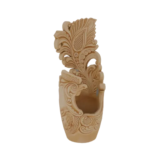 A 3D model of an ornate wall sconce featuring intricate floral carvings and a central cavity, presented against a black backg
