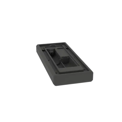 3D model of a dark gray rectangular battery compartment housing with internal divisions and mounting points.
