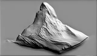 3D model of Matterhorn bas-relief, front view, showing detailed relief of slopes and summit.