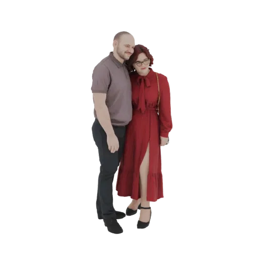 3D model of a couple embracing, the woman in a red dress and the man in a grey polo shirt, against a white background.