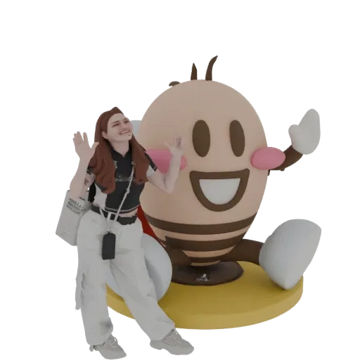 3D model of a happy bee mascot and a smiling girl in casual clothes, posing together on a yellow base.