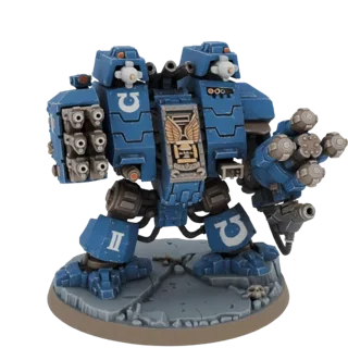 Modèle 3D d'un Dreadnought Space Marine bleu avec Lascannon jumeau et pods missiles, sur une base rocheuse.