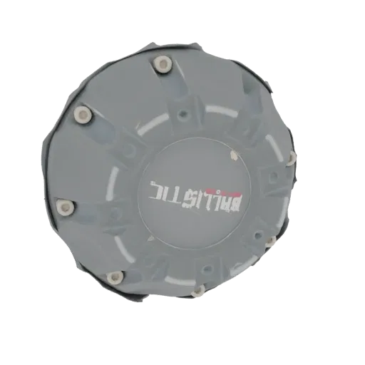 A 3D render of a gray Ballistic wheel center cap with the 'BALLISTIC' logo in red and white, set against a black background.