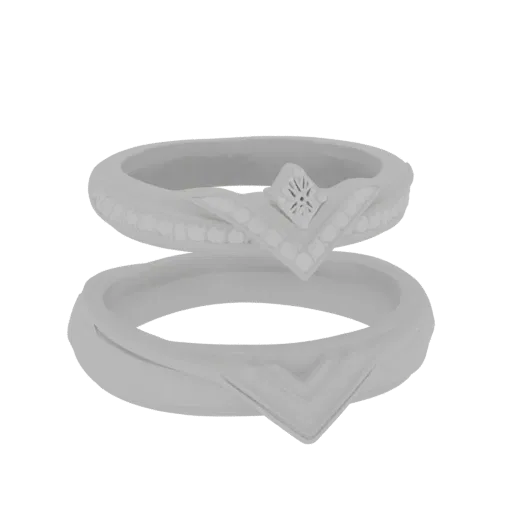 3D render of a V-shaped engagement ring set, showing two interlocking rings with delicate stone accents and a central V-shape