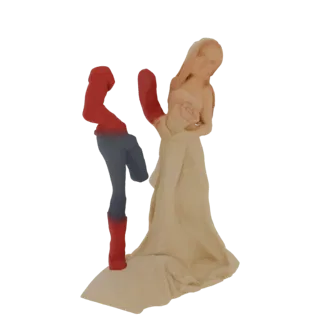 Figura 3D de pareja bailando, la mujer con vestido vaporoso y el hombre con atuendo rojo y azul, sobre una base decorativa.