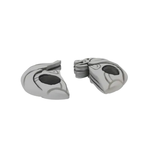 3D model of two ancient stone rune fragments with carved swirling patterns, separated.
