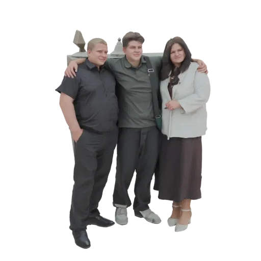 3D model of three friends, two men and one woman, posing together with arms around each other.