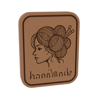 Modelo 3D de um logo artesanal apresentando o perfil de uma mulher com cabelo estilizado como novelos de lã e agulhas de tric