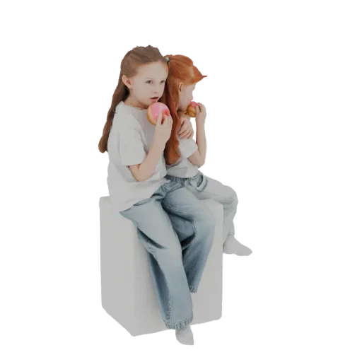 3D model of two young girls sitting on a white cube, each holding and eating a donut.