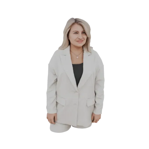 3D model of a woman wearing a white blazer and black top, with blonde hair and a pendant necklace.
