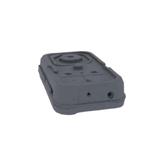 Modèle 3D d'un boîtier gris robuste pour télécommande d'activation, avec des ouvertures visibles pour connecteurs et un bouto