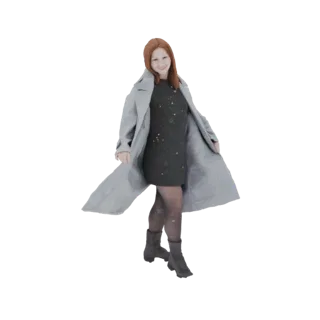 3D model of a woman with auburn hair, wearing a grey winter coat and a dark speckled dress, with her coat flowing.