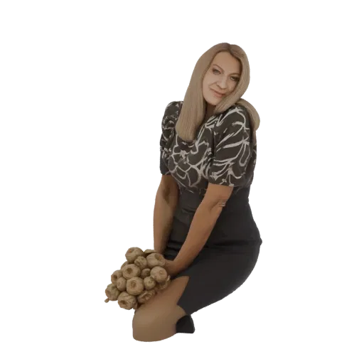 3D model of an elegant woman kneeling with a bouquet of flowers, wearing a black and white patterned top and a dark skirt.
