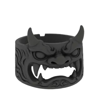 3D model of a dark gray ring featuring a detailed Oni mask with sharp fangs and horns, set against a black background.