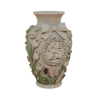 3D model of a decorative vase with a bow, bunnies, 'XB' letters, and floral bas-relief
